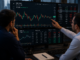 XRP faces resistance below the 50-Day EMA despite improving momentum